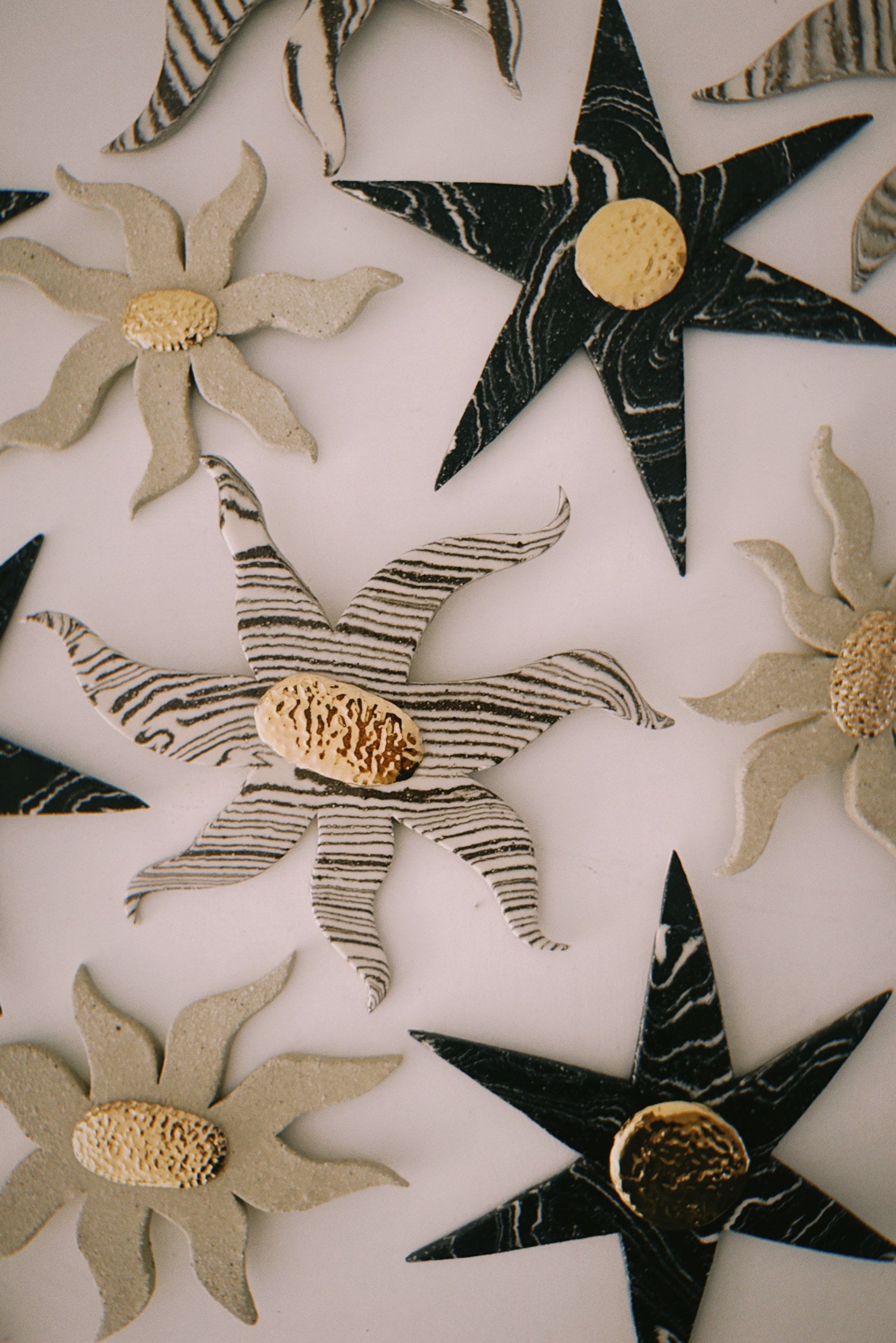 Ceramic wallflowers by Tantri Mustika