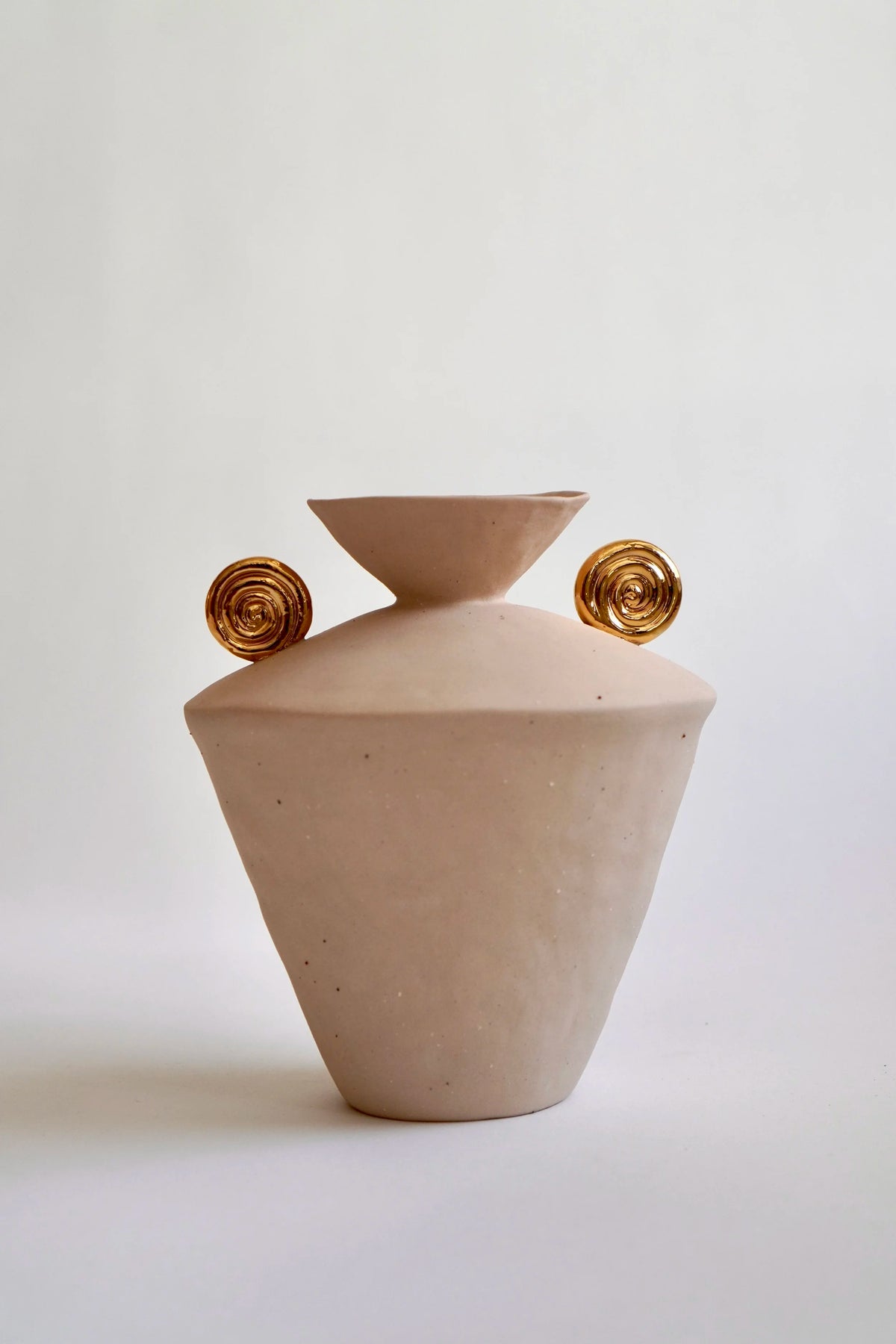 Peach Relic Vase with Golden Spirals by Tantri Mustika