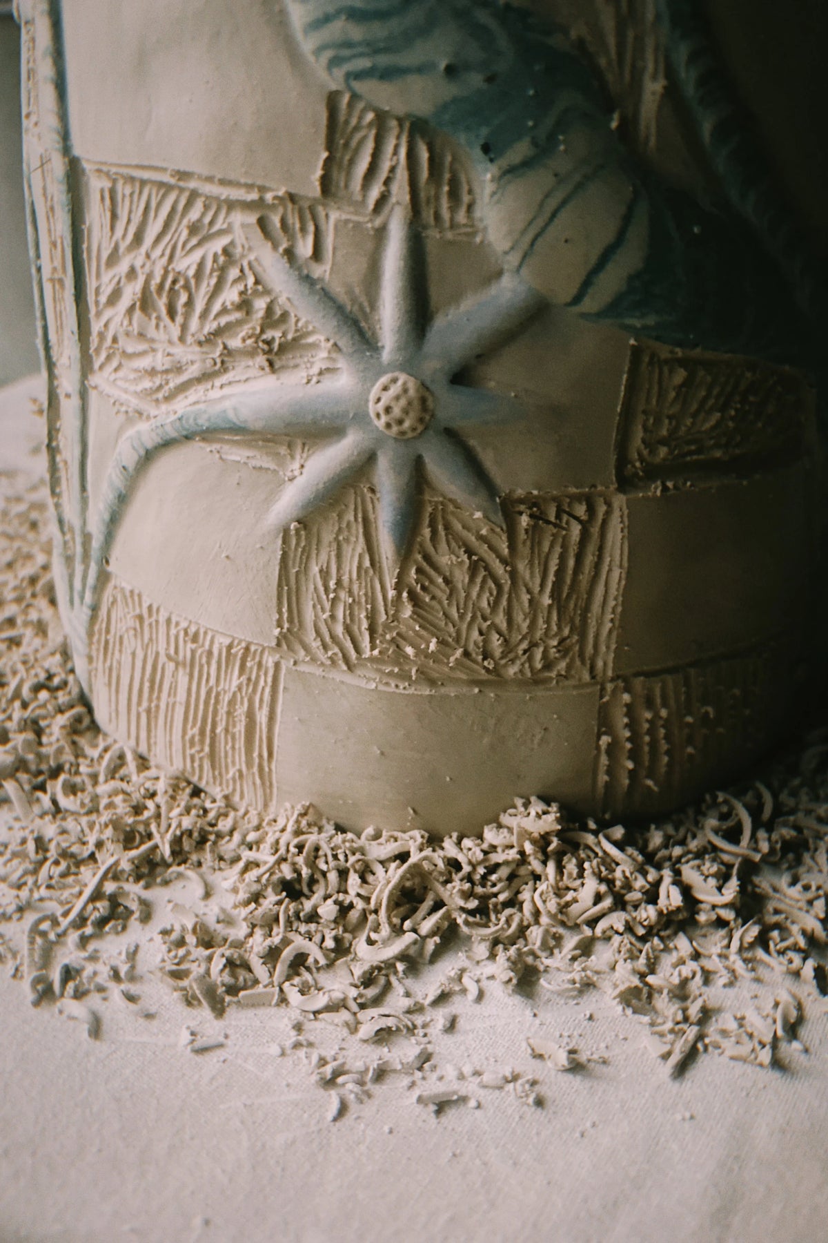 Carving, with the shavings still on the bench, in Tantri Mustika’s studio