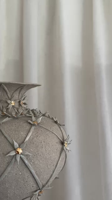 Lattice Vessel by Tantri Mustika, turning on its plinth