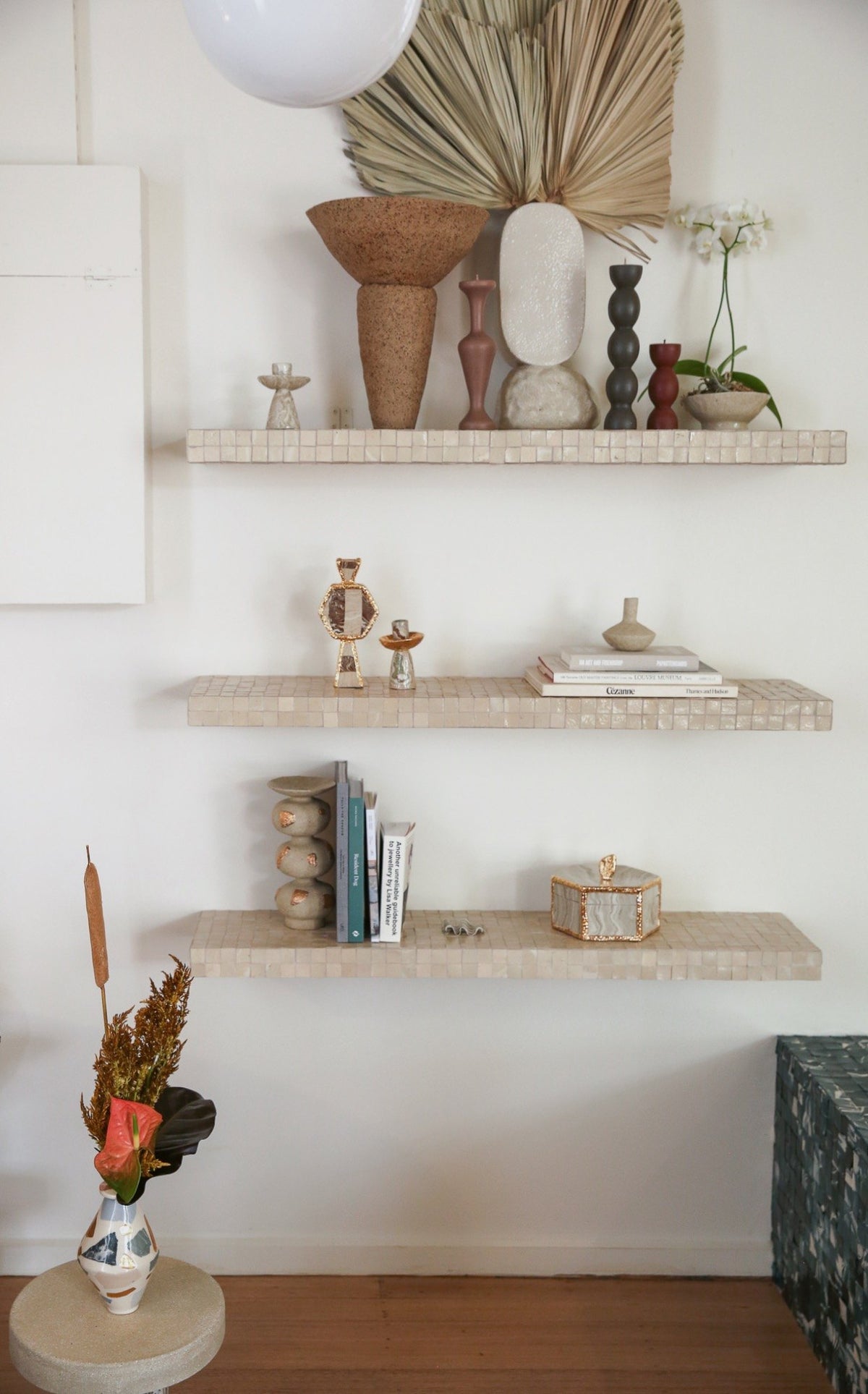 Shelves of ceramic vessels and objects by Tantri Mustika in FOND, 2022