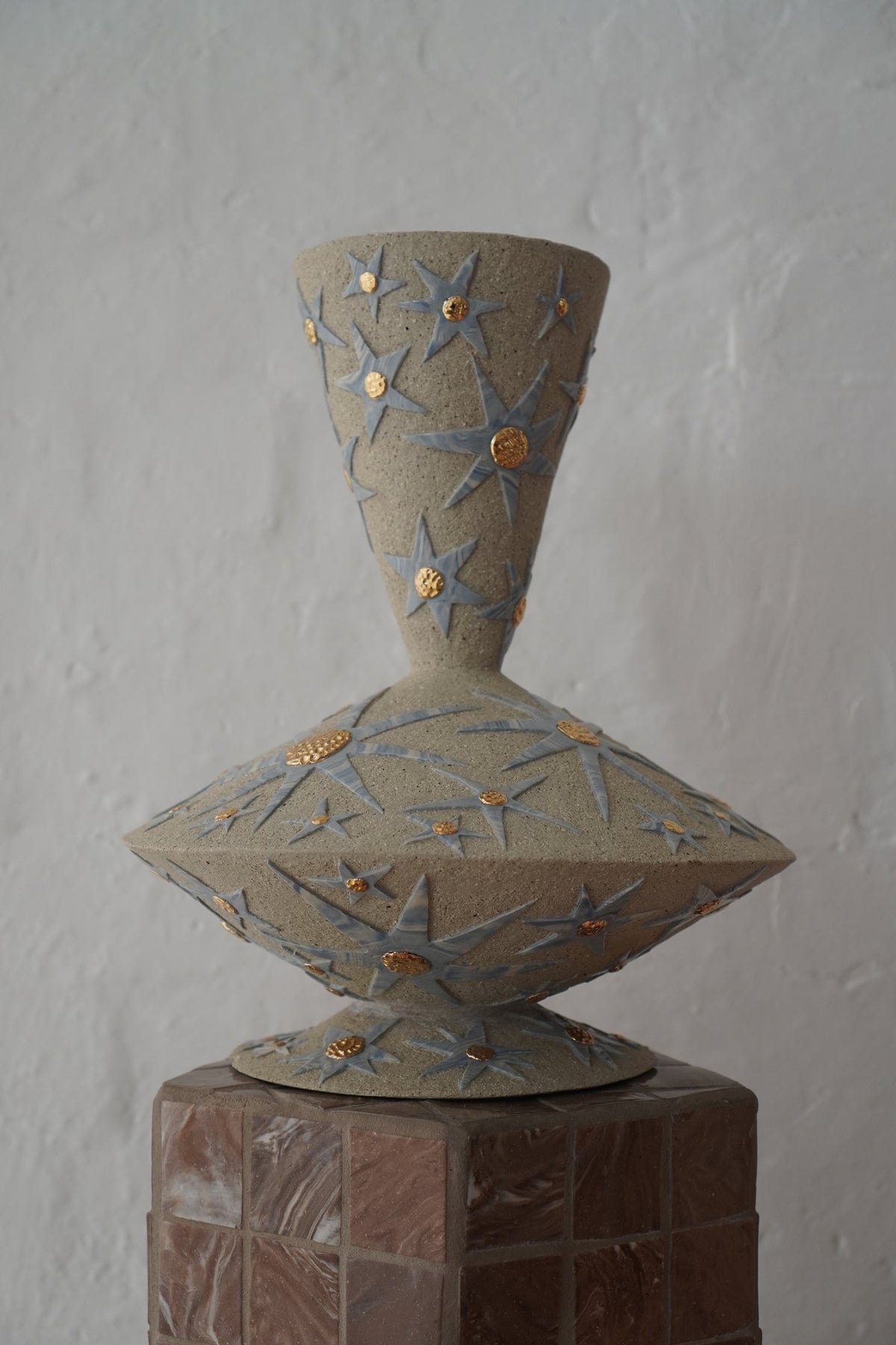 “It’s already written in the stars” #2 by Tantri Mustika: a stoneware vessel with blue stars and gold lustre centres, 2024