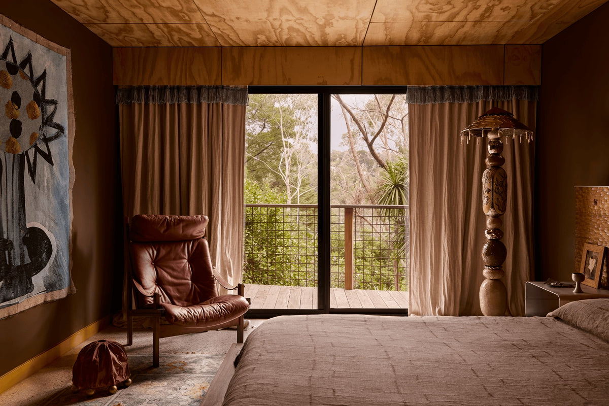 The Flow State floor lamp by Tantri Mustika in the plywood-lined bedroom of The View, Studio Shields’ home in the Yarra Valley