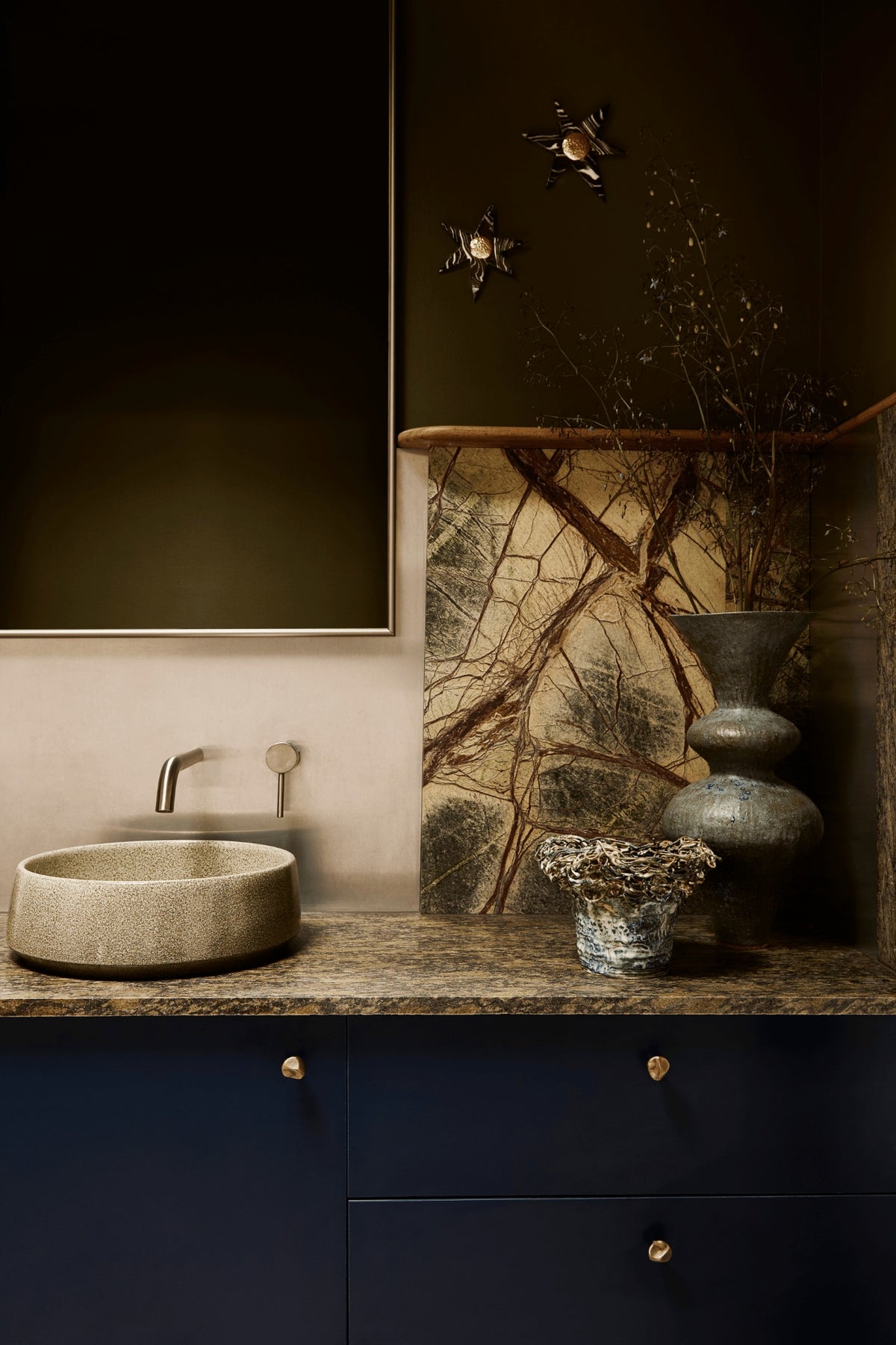 Wallflower stars by Tantri Mustika above the basin in the powder room of The View by Studio Shields